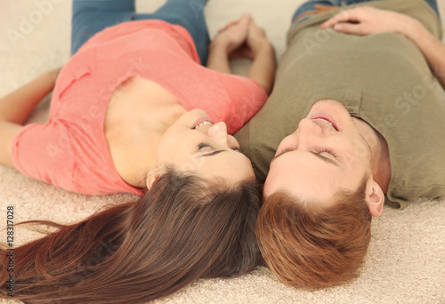Lovely couple relaxing on f...