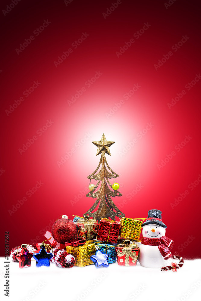 christmas in red background with snowman doll, decorations and gift
