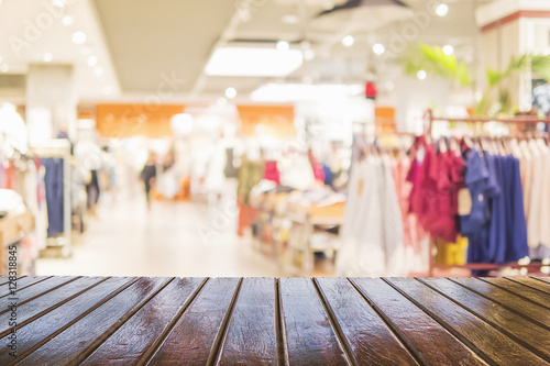 Brown wooden planks over blurred superstore background