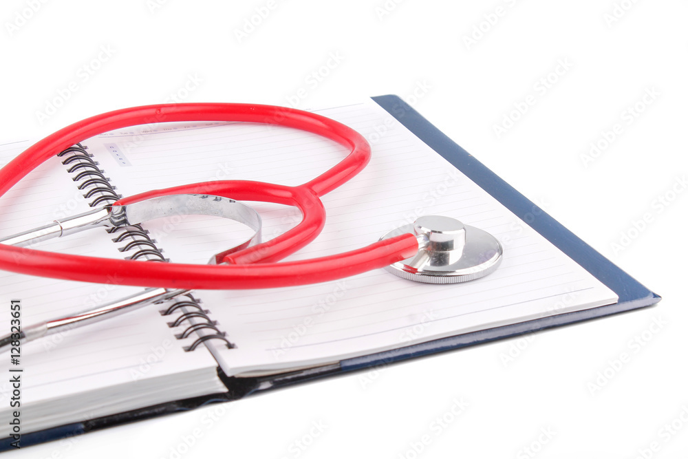 Medical concept. Stethoscope and open notebook on white background Medical concept. Stethoscope and open notebook on white background