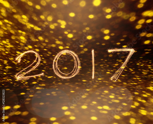 happy new years 2017 fireworks Sparkle alphabet on gold bokeh background. HAPPY NEW YEAR concept.