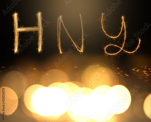 happy new years  fireworks Sparkle alphabet on gold bokeh background. HAPPY NEW YEAR concept..