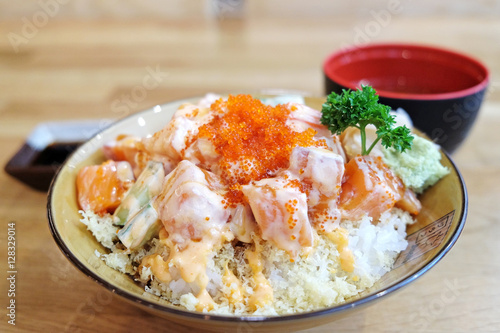 cube salmon spicy salad on rice with crunchy on top