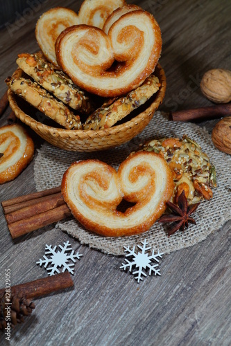 Cookies in the shape of hearts, stars and spices. Magical Christmas - selective focus 