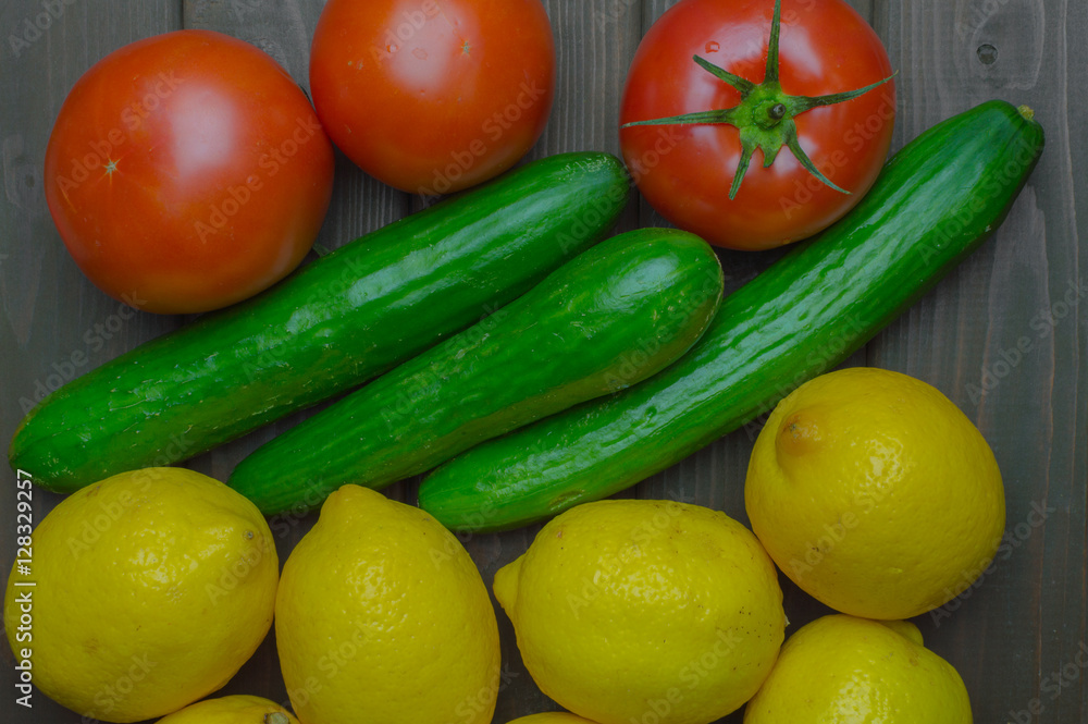 Fresh vegetables and fruits top view on dark wooden background. Fresh vegetables and fruits top view on dark wooden background.