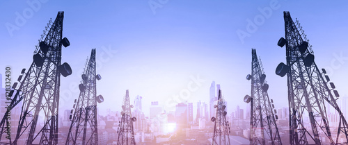 Tableau sur toile Silhouette, telecommunication towers with TV antennas and satellite dish in suns