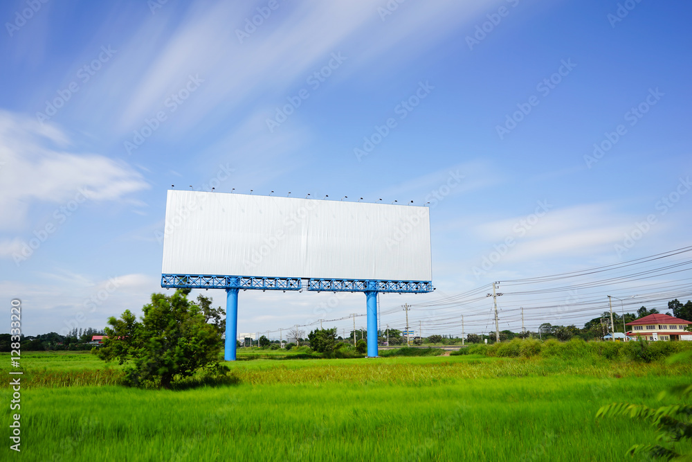 Blank billboard for advetising at rice field with moving cloud o Blank billboard for advetising at rice field with moving cloud o