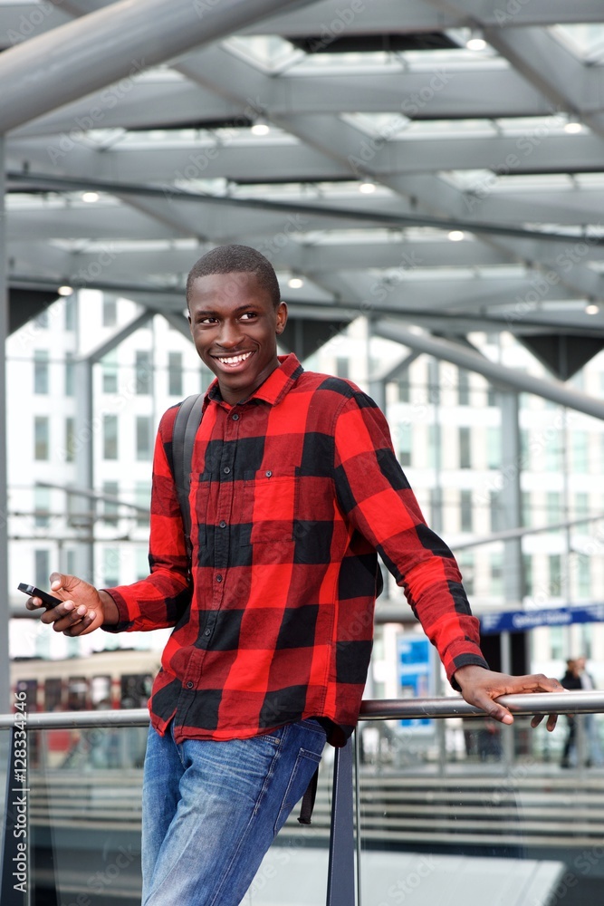 Happy african man at train station Happy african man at train station