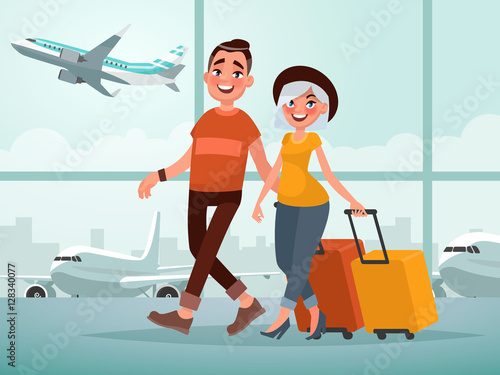 Traveling couple of young people. Man and woman with luggage are