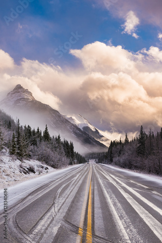 Winter in the mountains, frozen icy highway in the mountains after a blizzard