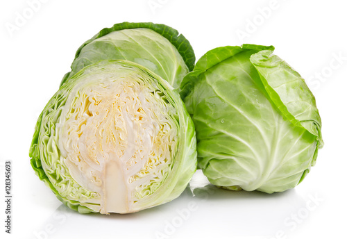 Leinwand Poster Green cabbage vegetables isolated on white