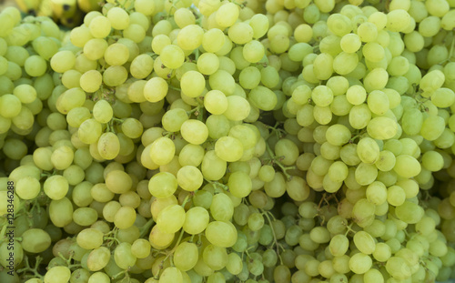 Grape. Wine grapes background.Green grapes. Grapes an market. It can be used as a food background (selective focus)