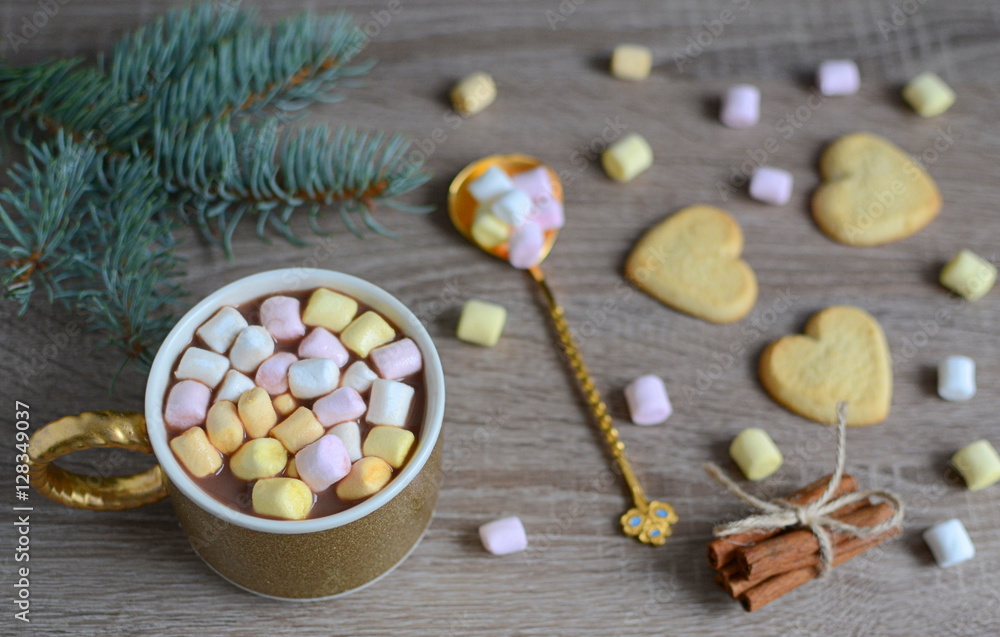 Hot cocoa with marshmallows and Christmas decorations