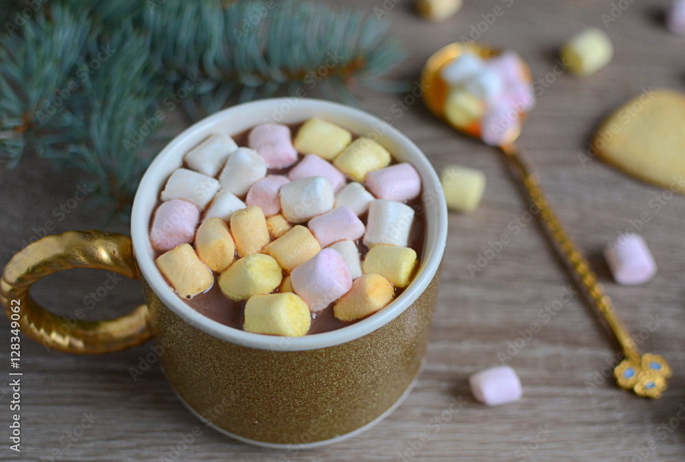 Hot cocoa with marshmallows and Christmas decorations Hot cocoa with marshmallows and Christmas decorations