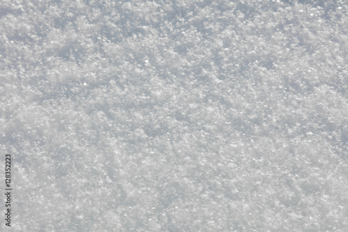 Real Snow texture background - snow-flakes crystals © Taiga
