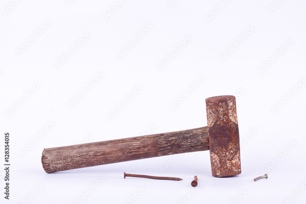 old rust Sledge hammer and rust nail tack used on white background tool