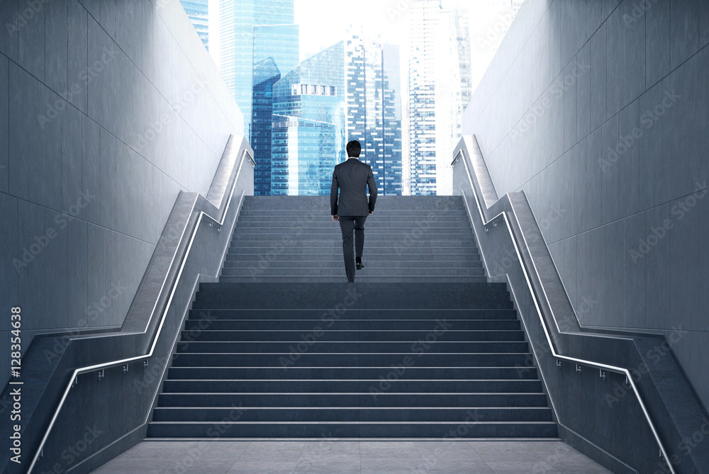 Rear view of a man going out of a tunnel Rear view of a man going out of a tunnel