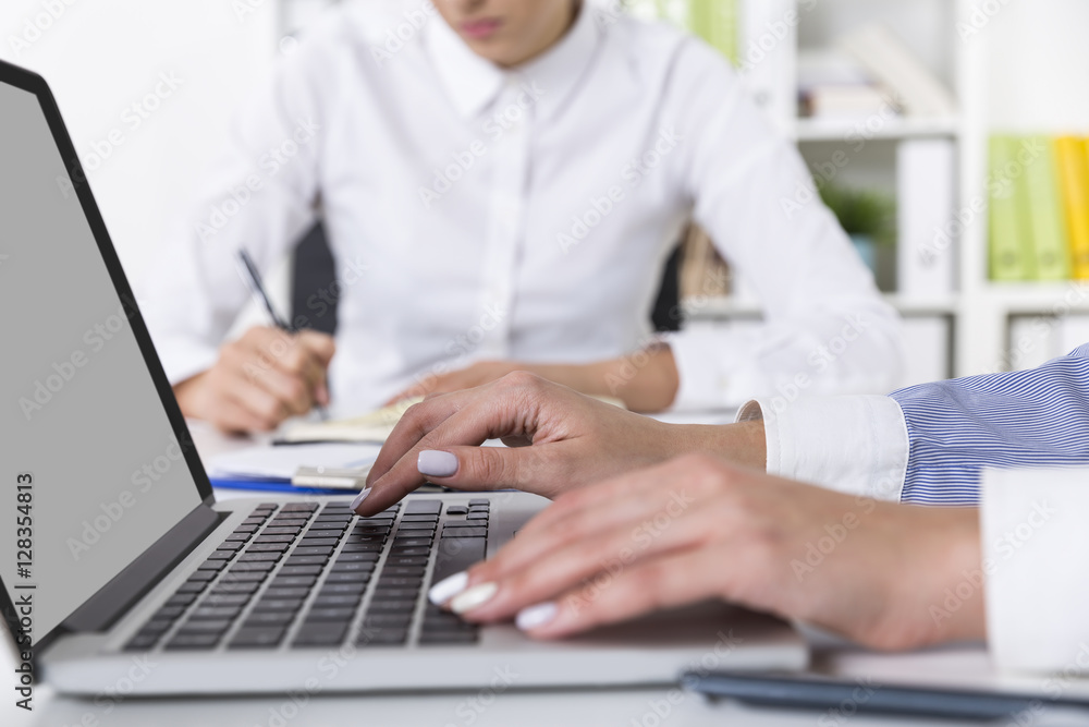 Woman with white nails is typing Woman with white nails is typing