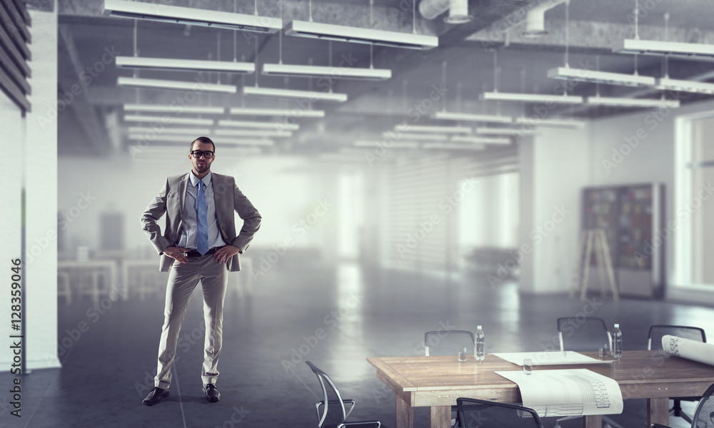 Businessman in his office . Mixed media Businessman in his office . Mixed media