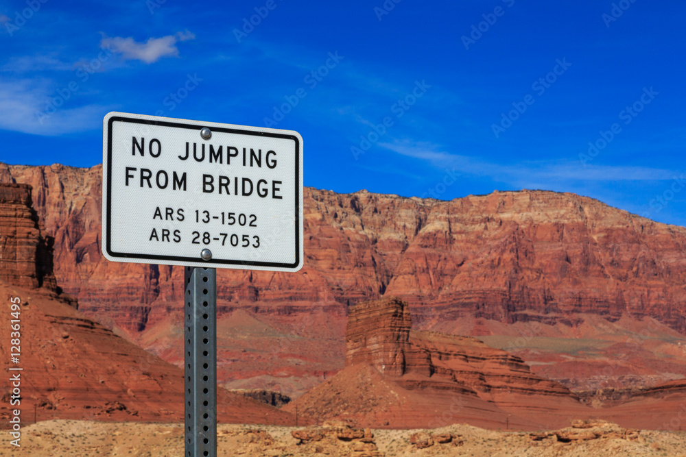 Signage with jumping restrictions on a foot bridge, Arizona, US Signage with jumping restrictions on a foot bridge, Arizona, US
