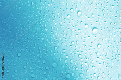 the water drop on fresh light blue background