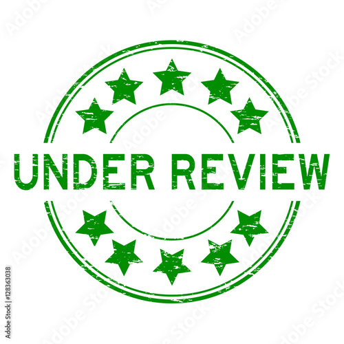 Grunge green under review with star icon round rubber stamp