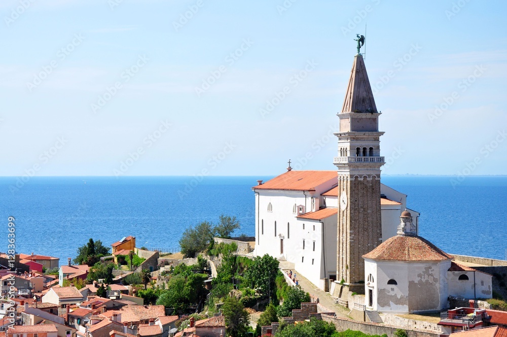 Fototapeta premium Piran city tower and church in sunn day, Slovenia