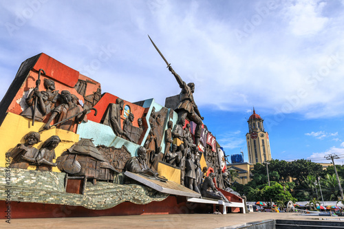 Katipunan (abbreviated to KKK) monument and clock tower of the Manila City Hall in Philippines photo