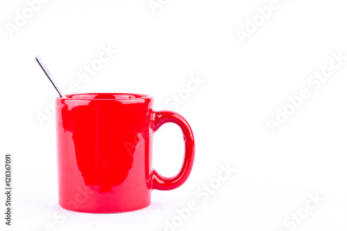 red coffee or tea cup and spoon on break time in white background drink isolated
