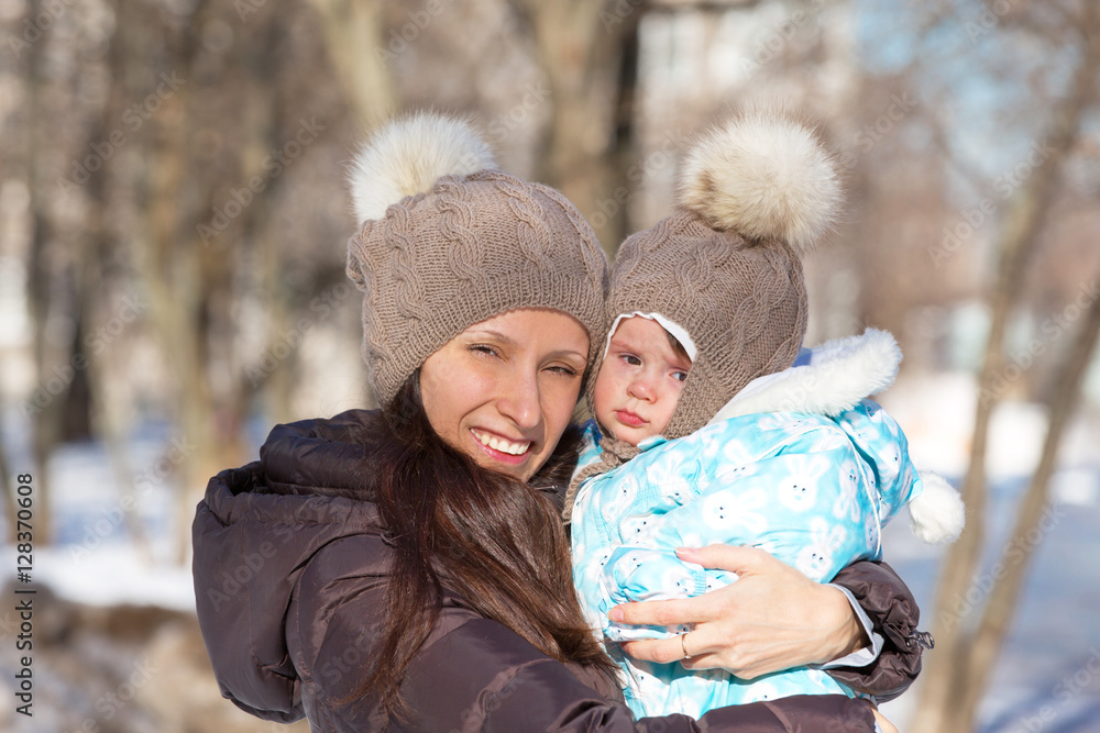 Mother and child on a winter walk Mother and child on a winter walk