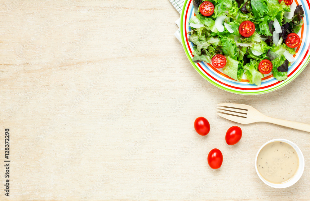 Top view cooking salad with sauce on wood table with copy space. Top view cooking salad with sauce on wood table with copy space.
