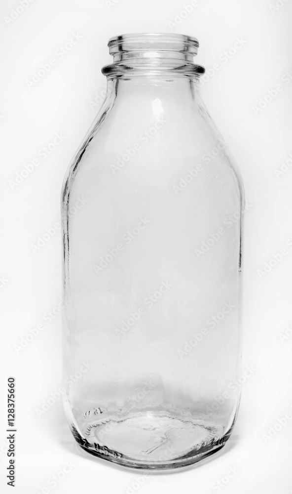 Old empty glass milk bottle. Vertical. Old empty glass milk bottle. Vertical.