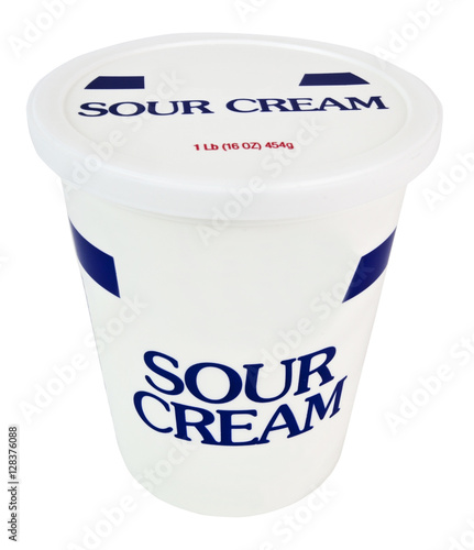 Container of sour cream. Vertical. 