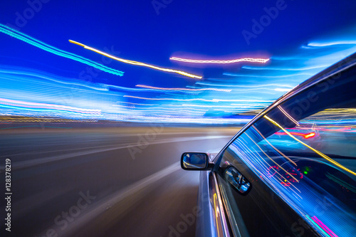 Blurred urban look of the car movement nights longexposure shot with cold colors