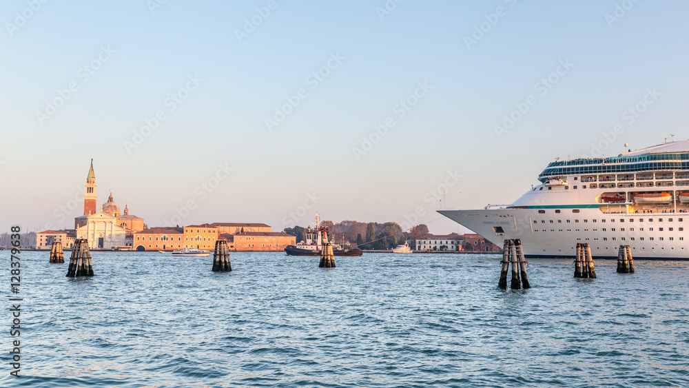 Big cruise ship with tourists leaving the city of Venice Italy