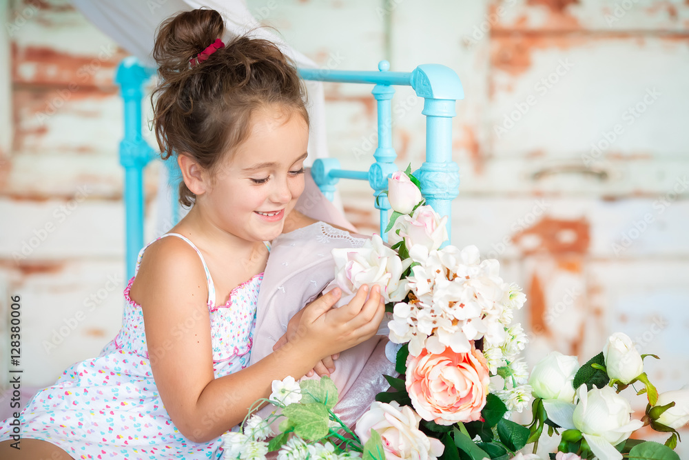A nice child girl enjoys sunny morning. Good morning at home. Ch A nice child girl enjoys sunny morning. Good morning at home. Ch