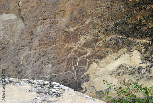 Prehistoric rock carvings petroglyph in Gobustan, Azerbaijan photo