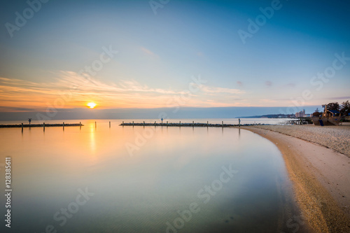 Long exposure of the Chesapeake Bay at sunrise, in North Beach, © jonbilous