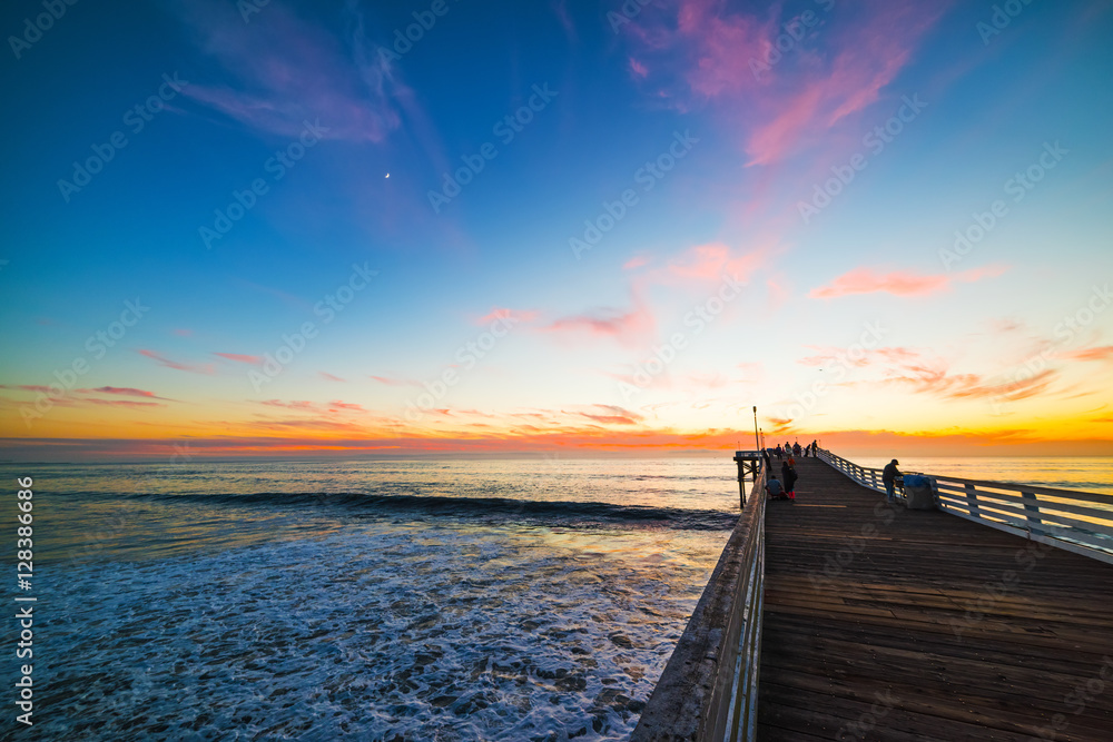 Wooden pier in Pacific Beach at sunset
