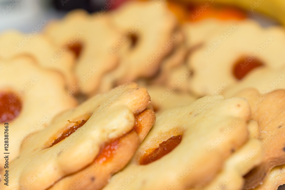 Homemade apricot jam Linzer with fruits close up Homemade apricot jam Linzer with fruits close up