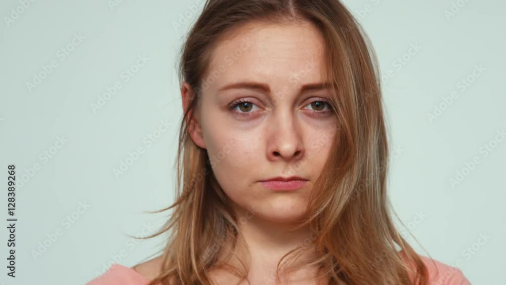 Sad. Portrait cute girl teenager 20 years old on white background Sad. Portrait cute girl teenager 20 years old on white background