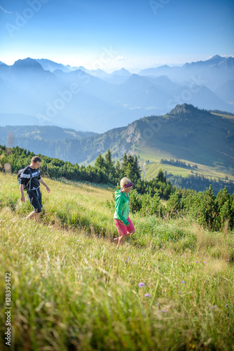 Young couple hiking, Austrian alps