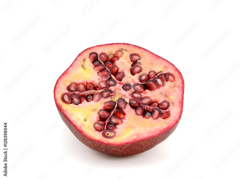 half of pomegranate fruit isolated on white background half of pomegranate fruit isolated on white background