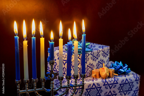 Jewish Holiday Hanukkah holiday with menorah burning candles.