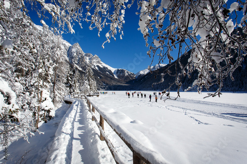 Obraz na płótnie Winter landscape and winter forest near Antholz Lake, South Tirol, Italy. w salonie