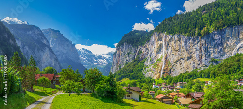 Famous Lauterbrunnen valley with gorgeous waterfall and Swiss Alps, Bern, Switzerland