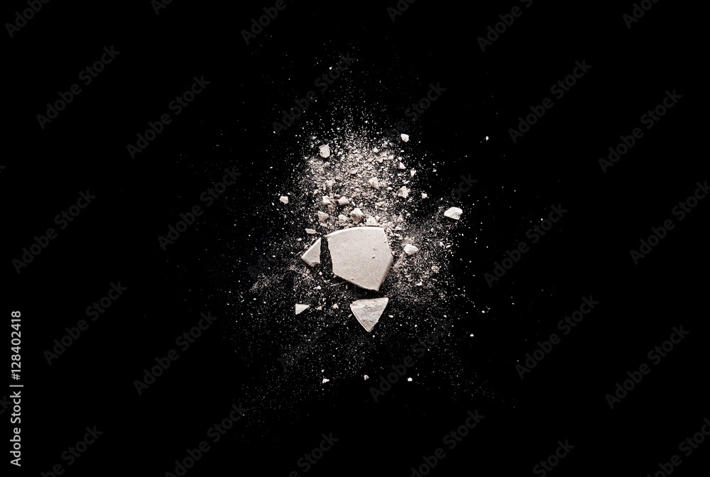 pink broken and spilled eye shadow on a black isolated background pink broken and spilled eye shadow on a black isolated background