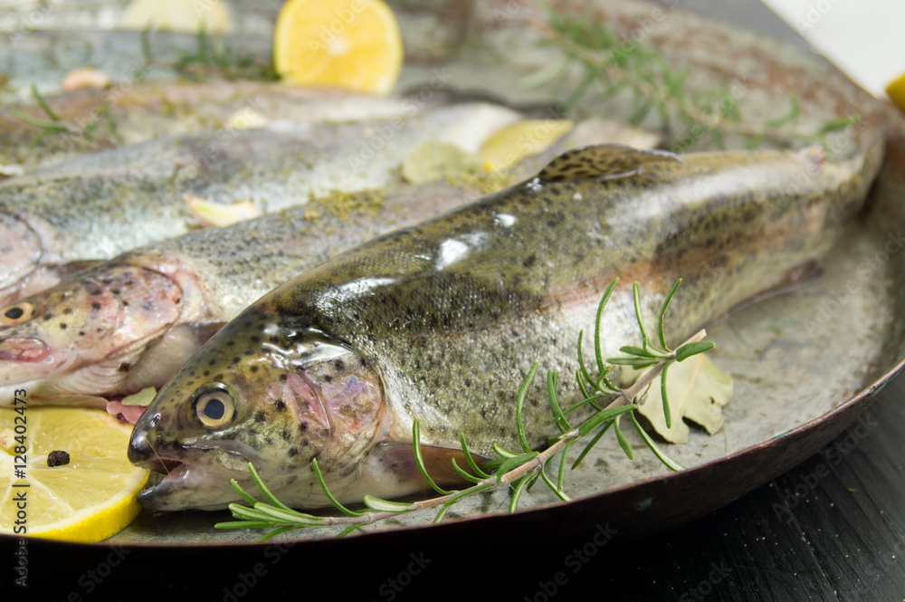 trout on a frying pan