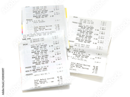 Pile of shopping receipts on white background