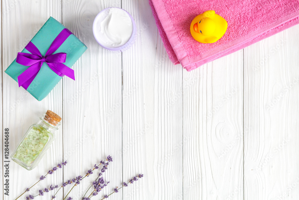 Natural organic cosmetics for baby with lavender on wooden background Natural organic cosmetics for baby with lavender on wooden background